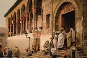 Férfiak jönnek ki egy tuniszi mecsetből