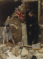 Brit civilek takarítják a romokat egy német légitámadást követően