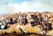A második komáromi csata, 1849. július 2-án Herkálypusztánál. Piros ruhában Görgei kalapjával lovasrohamot vezényel a Poeltenberg hadtest lovasságának. Than Mór festménye