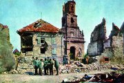 Német katonák tanácskoznak a lerombolt házak előtt