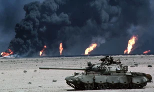 Adóssága törlesztésének elkerülése érdekében rohanta le Irak Kuvaitot